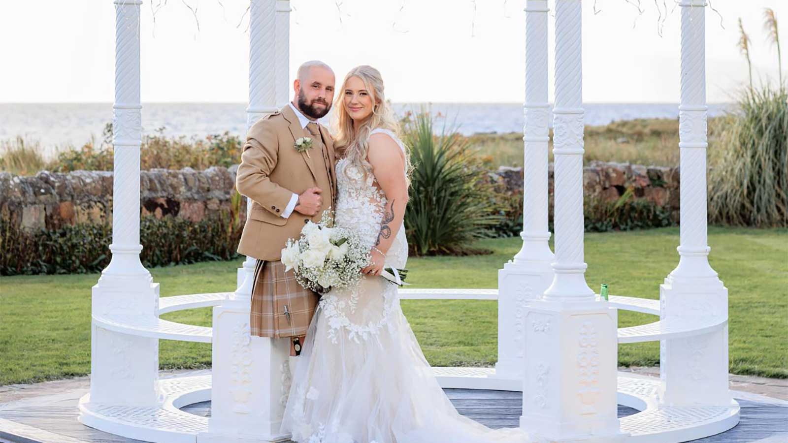 Lauren and Jordan Wedding at The Waterside. Picture in the wedding garden bandstand